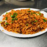 Goat Biryani · Goat cooked with basmati rice, ghee, aromatic herbs and
exotic spices