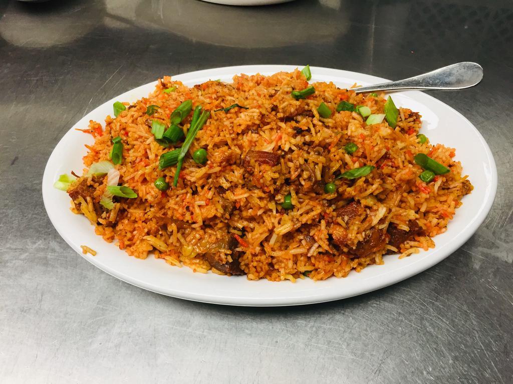 Goat Biryani · Goat cooked with basmati rice, ghee, aromatic herbs and
exotic spices