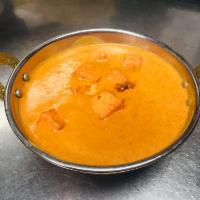 Paneer Tikka Masala · Cottage cheese cubes cooked in a spiced creamy sauce.