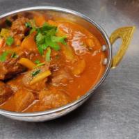 Lamb Kadai · Lamb cooked with onions, tomatoes and green bell peppers.