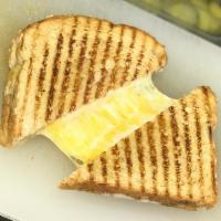 36. Cheesy Does It · Provolone, cheddar & Swiss cheese melted and grilled on your choice of sliced bread