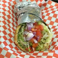 39. Veggie Tale Wrap · Veggie pita pocket: avocado, sprouts and hummus with shredded lettuce, tomatoes and red onion