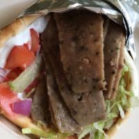 43. Greecy Wrap · Gyro with tzaziki. Served with shredded lettuce, tomatoes and red onion.