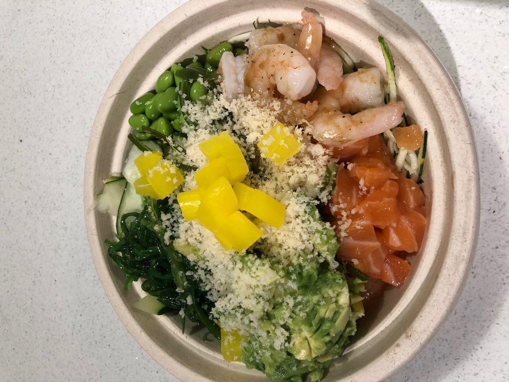 Poke Green · Salmon, shrimp, edamame, cucumber, green seaweed, avocado, seaweed salad, oshinko, poke green dressing, zucchini base, and tempura flake on top.