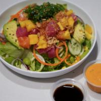 House Poke Salad · Tuna, salmon, edamame, cucumber, mango, corn, avocado, seaweed salad, spicy mayo and ponzu s...