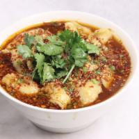 Boiled Fish Sichuan Style 水煮鱼片 · Famous Sichuan style boiled sole fish fillet with napa cabbage and celery in spicy sauce.