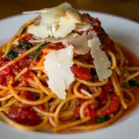 Spaghetti Pomodoro · Crushed Plum Tomatoes, Basil, Toasted Garlic