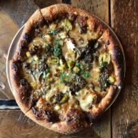 Vespa Pizza · porcini crema, mozz, roasted leeks, wild mushrooms, black truffle sauce