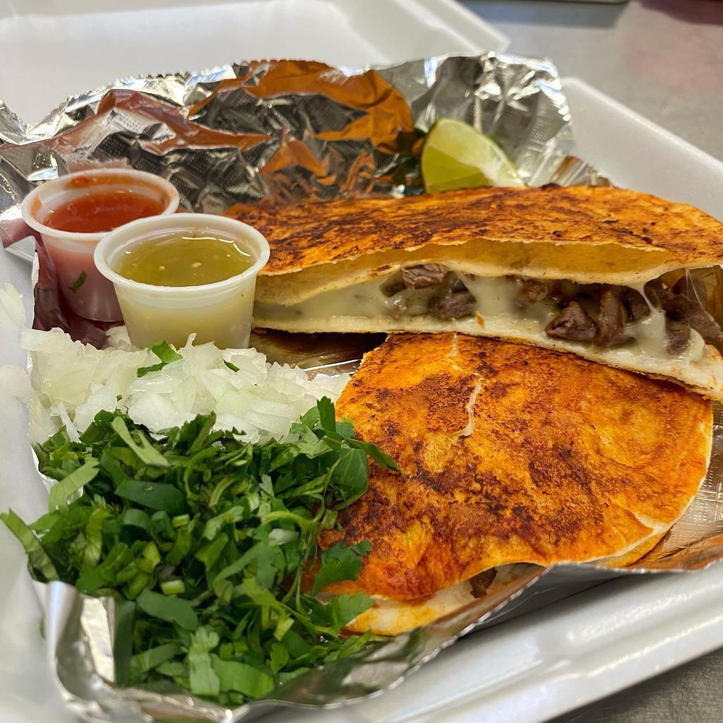 Los Tapatios Market · Meat Shops · Grocery · Tacos · Mexican · Lunch