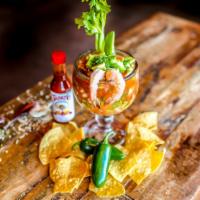 Coctail de Camaron · Mexican style shrimp cocktail made with clamato juice, ketchup, chopped tomatoes, onions, cu...