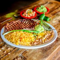 Carne Asada · Flavorful outside skirt meat with special seasonings and grilled to your specifications. Ser...