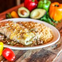 New Mexico Burrito · A flour tortilla filled with flavorful pork green chile, black beans, mixed shredded cheese,...