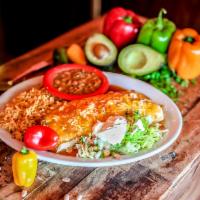 Miguel's Fiesta Fajita Burrito · A flour tortilla filled with your choice of grilled chicken or steak, mixed shredded cheese,...