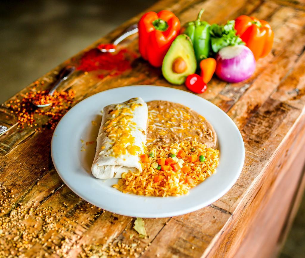 Kid Burrito · Flour tortilla filled with refried beans and cheese, chicken, shredded beef or ground beef. Served with Mexican rice and refried beans