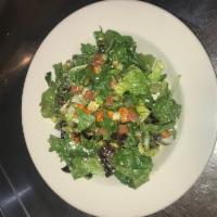 Side salad · Organic greens, tomatoes, cucumbers, pepitas, chili croutons and cotija cheese.