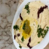 Hummus · Creamy tahini & chickpea served with pita