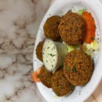 Falafel Appetizer · Deep fried chickpeas onion & parsley mixed with spices