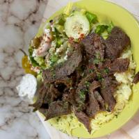 Gyro Plate · Thinly cut mixture of lamb & beef mixed with our special spices - served with tzatziki sauce...