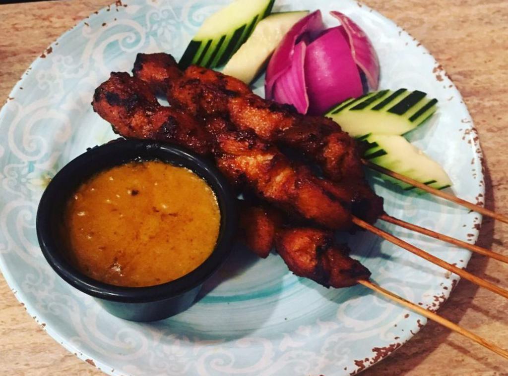 Satay Chicken · Grilled marinated skewers are served with a peanut sauce that’s so tasty, you’ll want to save it for other dishes, too!