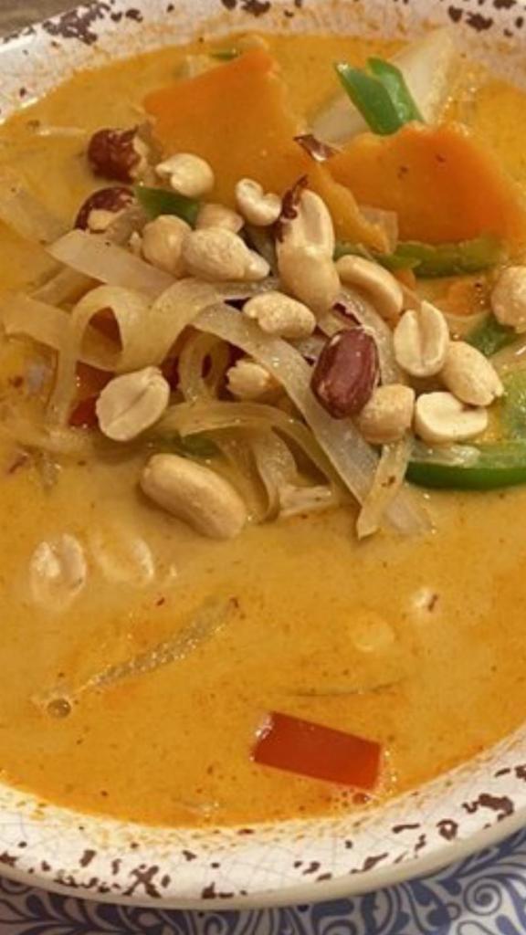 Massaman Curry Dinner · This Southern Thai signature dish has a heavy Indian influence. Cooked with onion, potato, peanut and coconut milk. Gluten free.