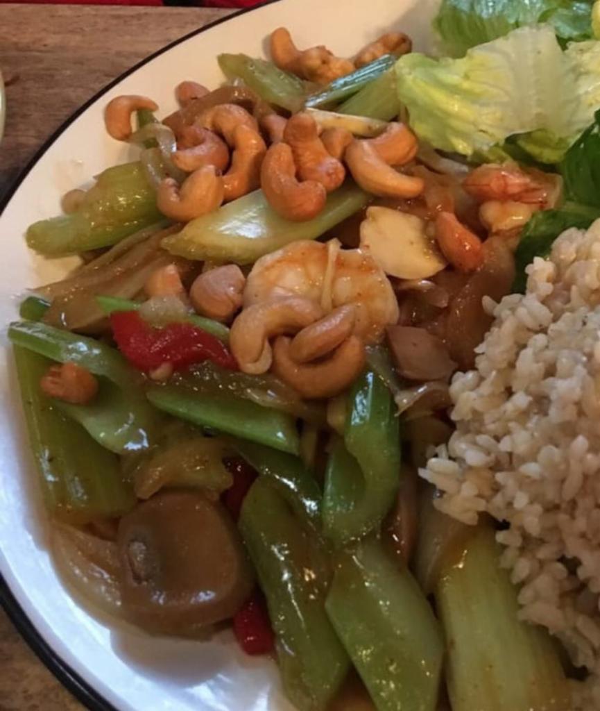 Thai Cashew Dinner · Cashews are sautéed with celery, bell peppers, onions, bamboo shoots, and mushrooms in a mild chili sauce.