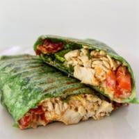 Chicken Bacon Ranch Wrap · made with romaine lettuce, diced chicken breast, bacon, Mexican blend cheese, tomato, and ou...