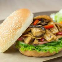Black Pepper Mushroom Burger · King oyster mushroom, shiitake mushroom, lettuce, cucumber, apple and black pepper sauce.