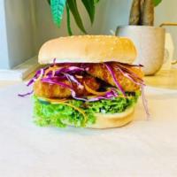 Sweet & Spicy Tofu Burger · Breaded Fried Tofu, lettuce, cucumber, red cabbage, carrot, mayo and homemade sweet & spicy ...