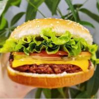 Beyond Burger · Beyond patty, lettuce, tomato, pickles, vegan mayo, vegan cheese, choice of sauce.
