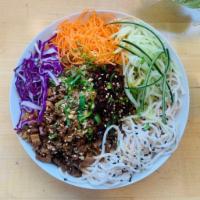 Zhajiang Noodle (Spicy) · Braised vegan minced pork and tofu, noodles, red cabbage, cucumber, carrot, cilantro, peanut...