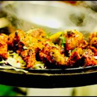 Chicken Reshmi Kabab · Mouthwatering and succulent pieces of chicken and coriander in tomatoes and onions marinated...