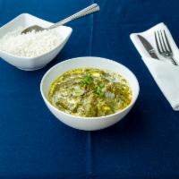 Saag Paneer · Homemade cheese and spinach simmered in a cream sauce.