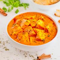Paneer Tikka Masala · Indian cottage cheese cubes grilled to perfection and cooked in gravy with bell peppers, oni...