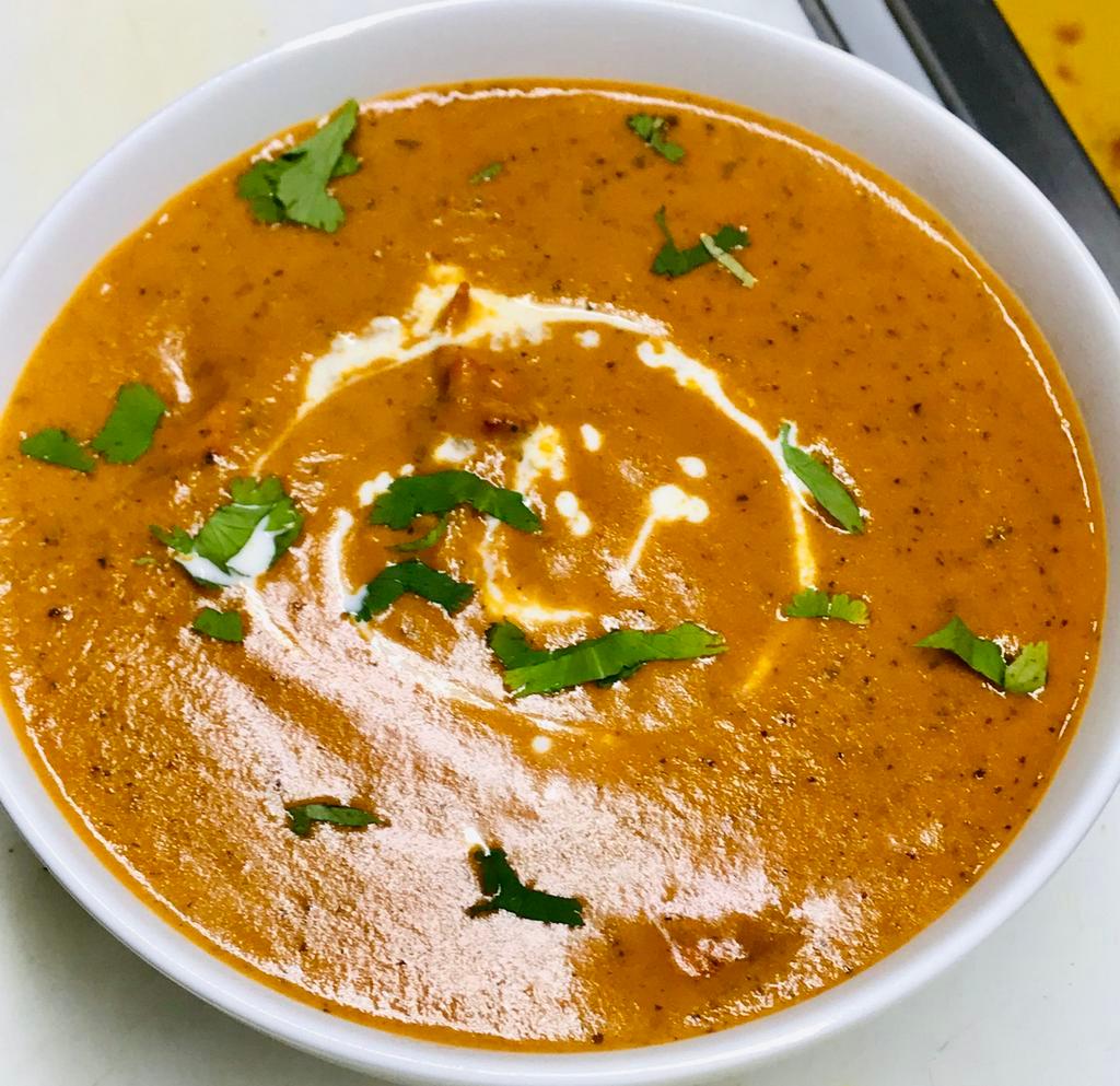 Dal Makhani · A mixture of lentils and kidney beans cooked with fresh Indian spices.