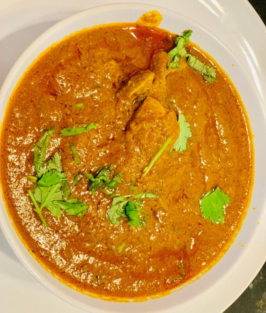 Lamb Bhuna · Tender cubes of lamb cooked with onions, garlic, ginger and bell peppers with curry sauce.
