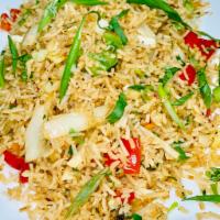 Veg. Fried Rice · Rice tossed with ginger, garlic and vegetables with Indo-Chinese spices.