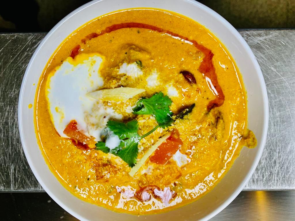 Fish Malabari · A traditional fish curry with an array of Indian spices, cooked with coconut milk.