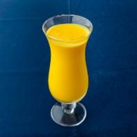 Mango Lassi · Traditional Indian mango flavored sweet yogurt beverage.