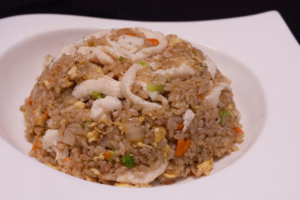 Chicken fried rice  · marinated chicken breast Fried rice with salt pepper，soy sauce and homemade garlic butter。