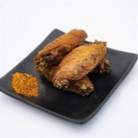 F3 Wazu Pepper Salt Chicken Wings 佤族椒盐鸡翅 · Cooked wing of a chicken coated in sauce or seasoning.