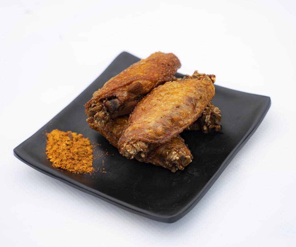 F3 Wazu Pepper Salt Chicken Wings 佤族椒盐鸡翅 · Cooked wing of a chicken coated in sauce or seasoning.