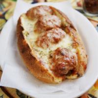 Meatball Parmesan Sub · Homemade meatballs and sauce with melted mozzarella.