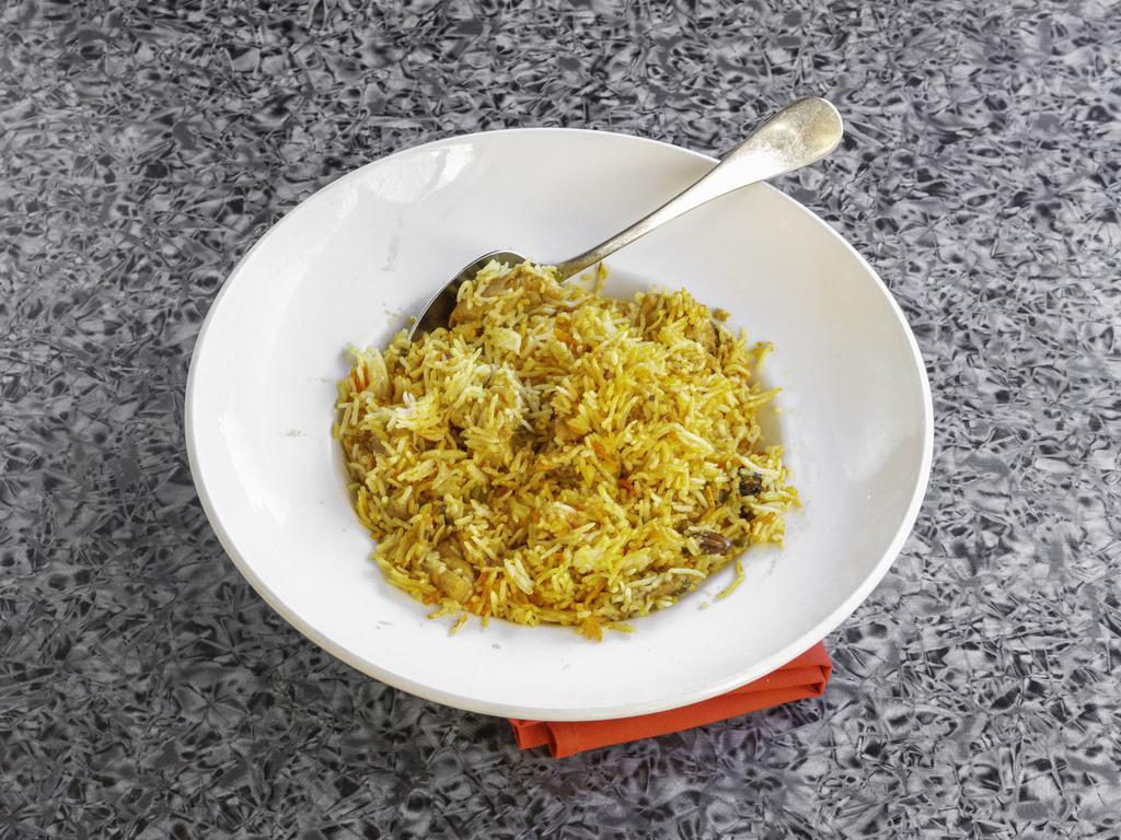 Chicken Biryani · Rice cooked with chicken.