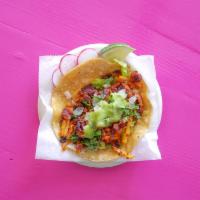 Al Pastor Taco · soft corn tortillas, lettuce, onions, cilantro & salsa verde