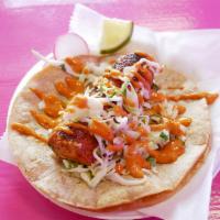 Grilled Salmon Taco  · marinated salmon, soft corn tortilla, cilantro slaw & chipotle mayo