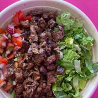 Carne Asada Burrito · marinated hanger steak, rice, black beans, cheese, lettuce & pico de gallo