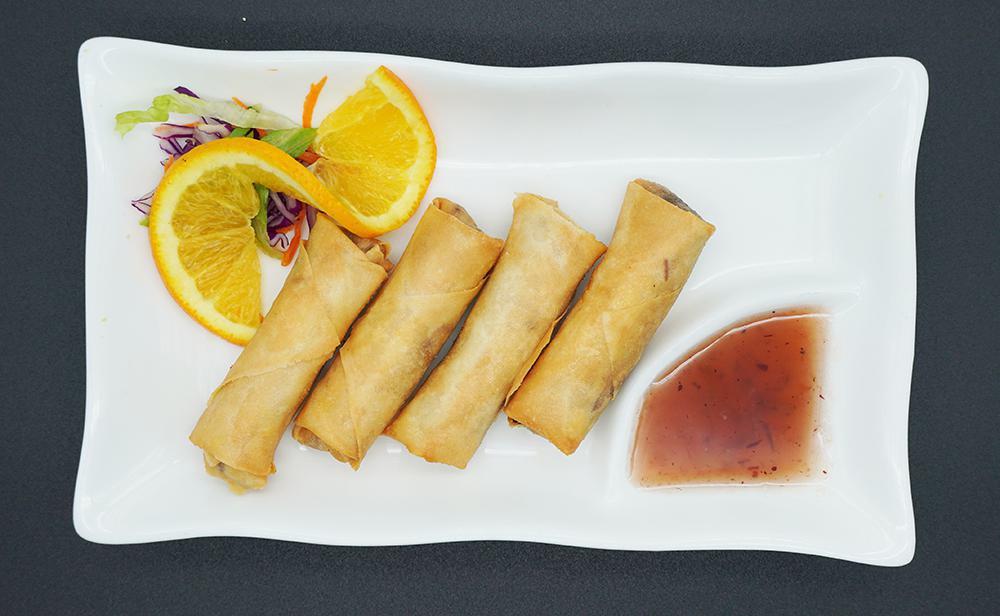 1. Thai Spring Rolls · 4 pieces. Glass noodles, carrots, cabbage, taro and celery in a rice paper roll, deep-fried until crispy and served with homemade orange sour sauce. Vegetarian and gluten free.