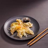4. Pot Stickers · 6 pieces. Homemade dumplings stuffed with vegetables and served with Thai-style soy ginger s...