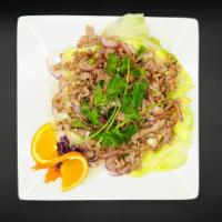 29. Larb Salad · Choice of ground chicken, pork or beef with shallots, green onions, mint and ground roasted ...