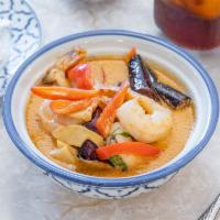 33. Red Curry · Eggplant, bamboo shoots, bell pepper and basil with homemade red Thai chili. Spicy.